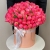 Композиция в шляпной коробке из 113 пионов Корал Шарм в Дубне