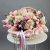 Композиция в корзине "Диодора" из французских роз Квиксенд, диантусов и кустовых пионовидных роз Бомбастик в Дубне